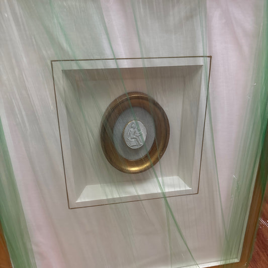 Intaglio with oval and blue linen