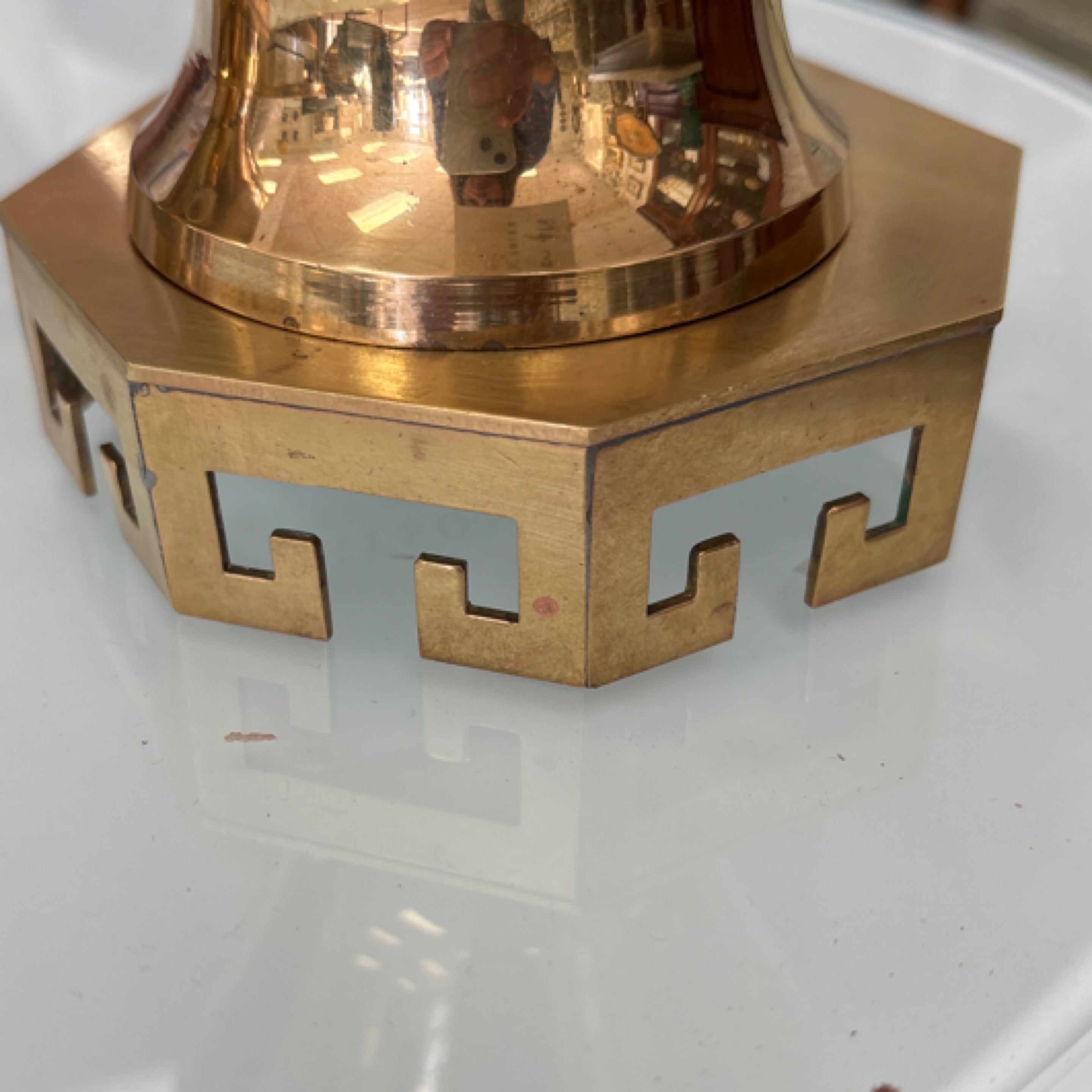 Greek key brass riser – Grayson Carter Design